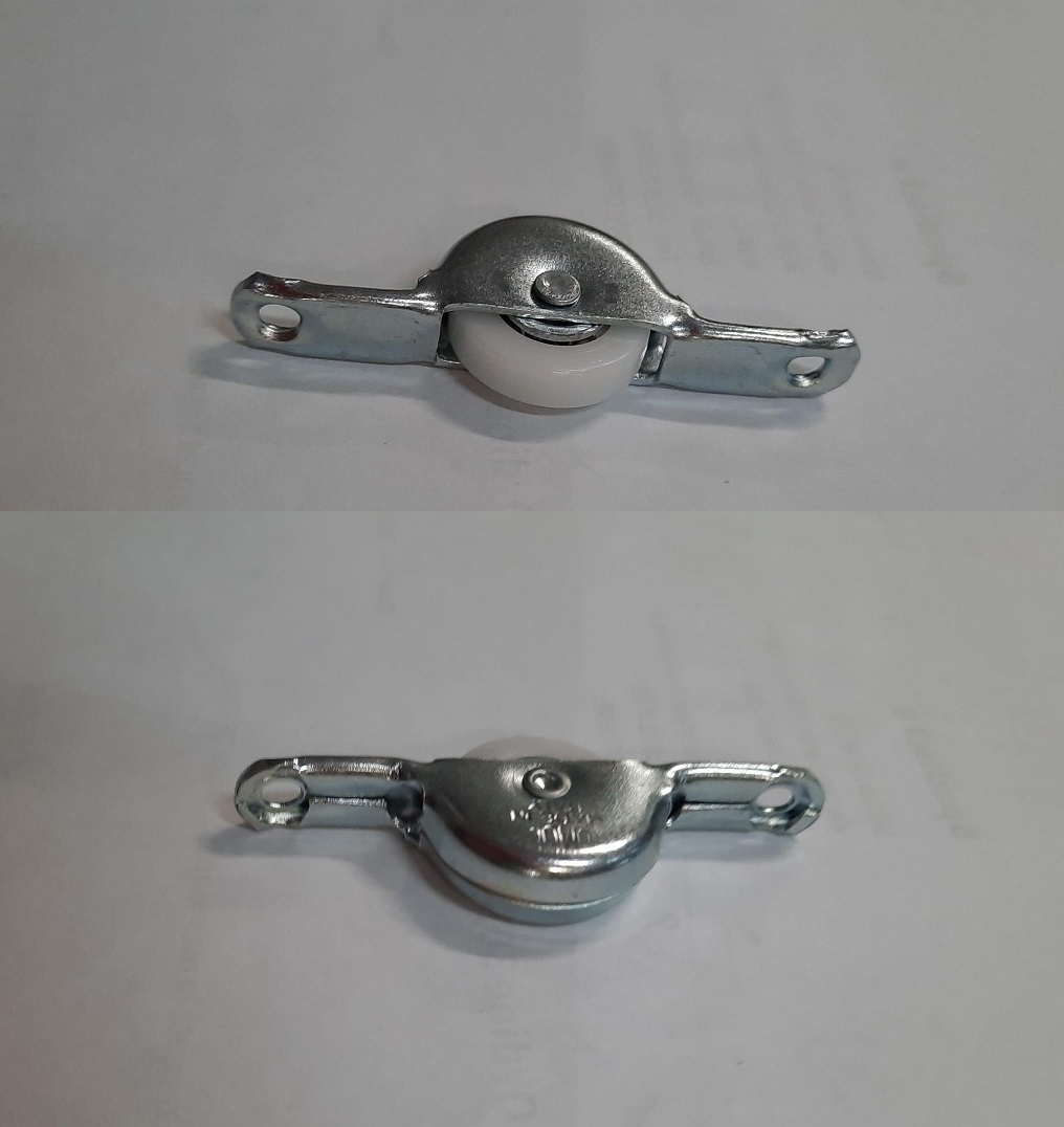 Pattino in acciaio con ruota in acciaio-nylon COMFERUT