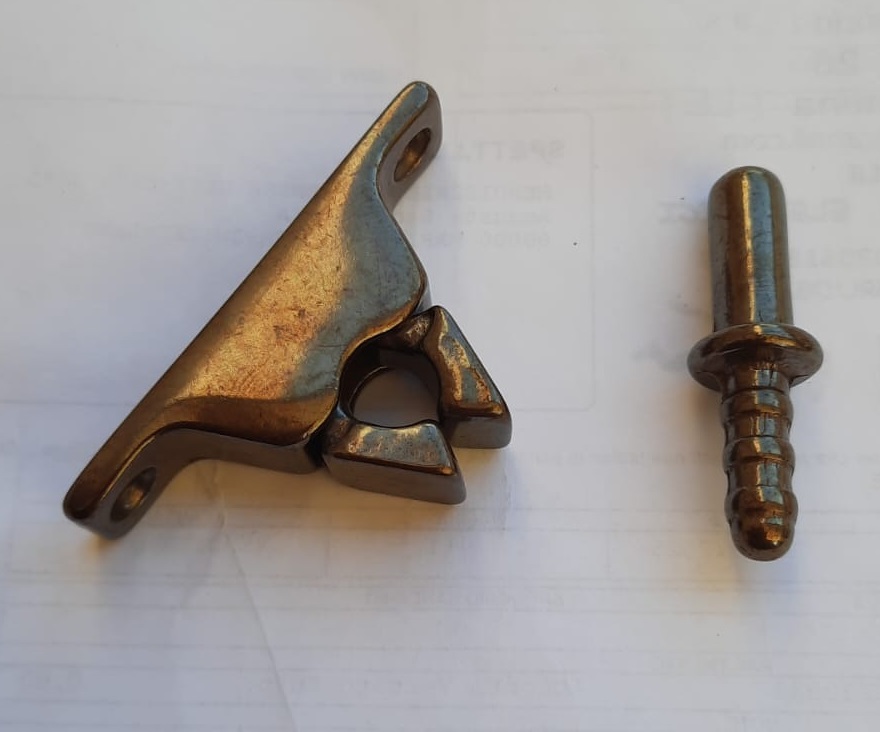 Fermaporta a pinza in ottone bronzata