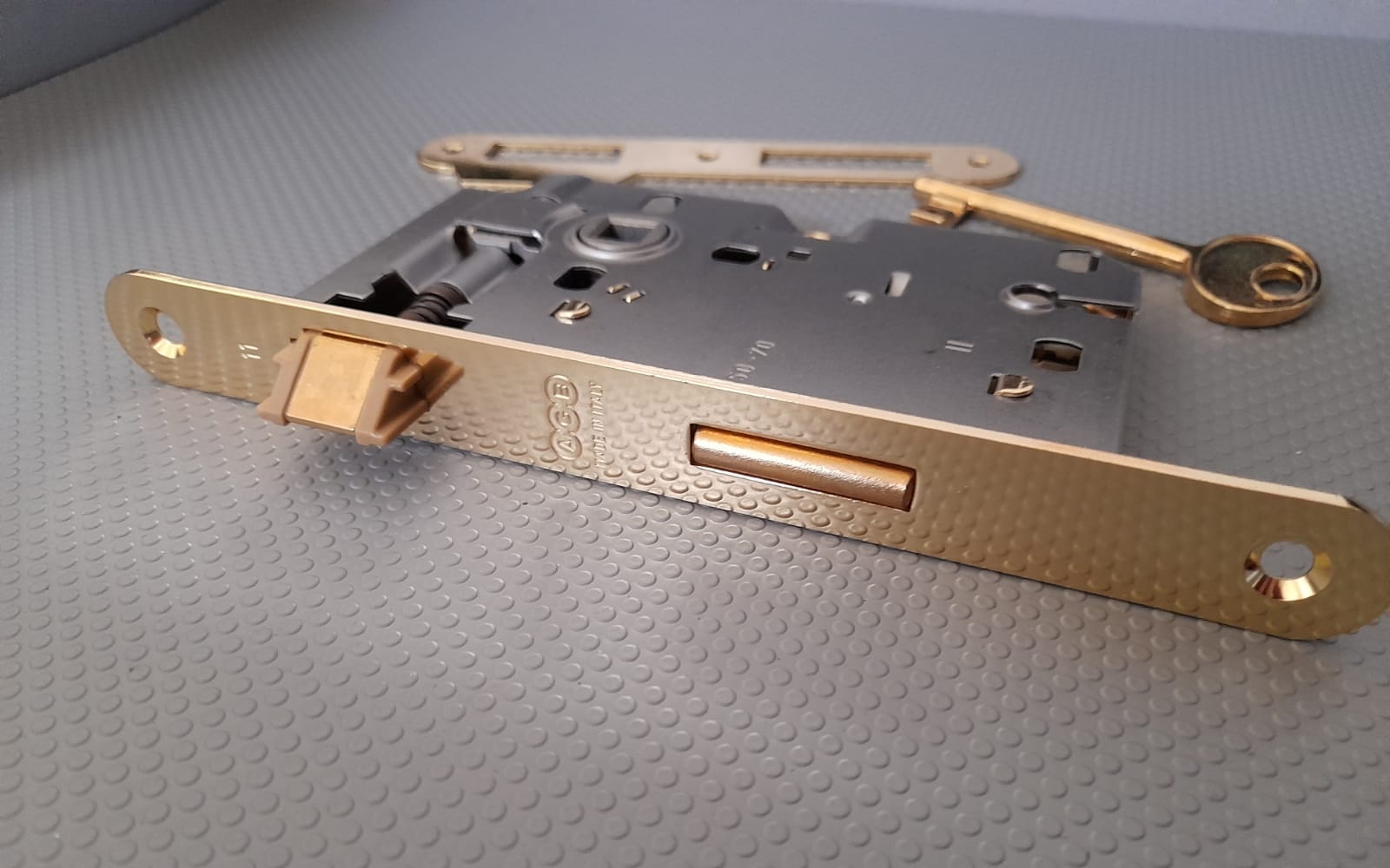 Serratura patent piccola ottonata bordo TONDO agb B00571