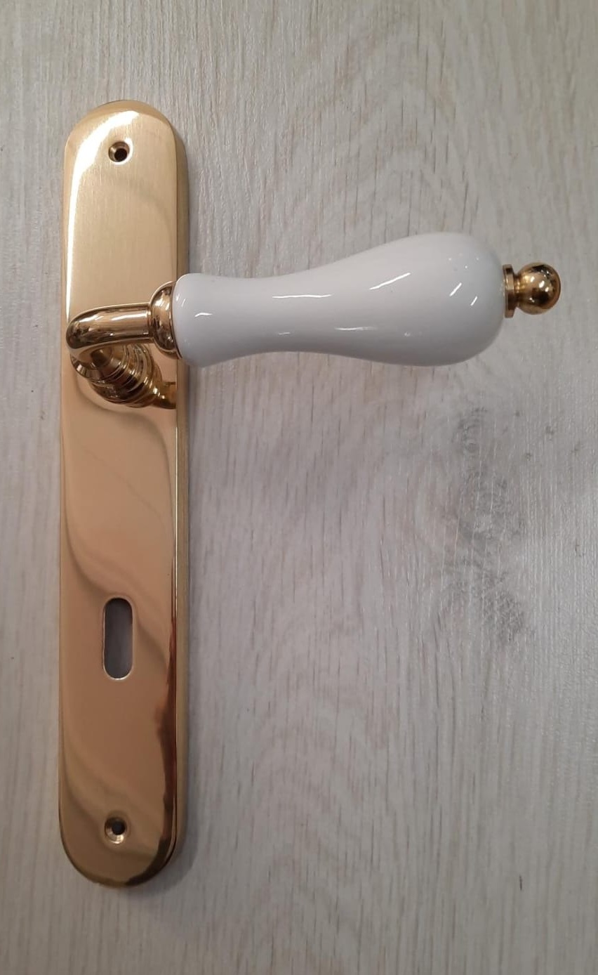 Maniglia per porta Sonia porcellana con placca COTTALI bianca ottone