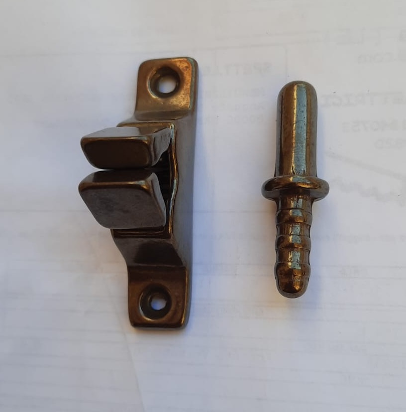 Fermaporta a pinza in ottone bronzata