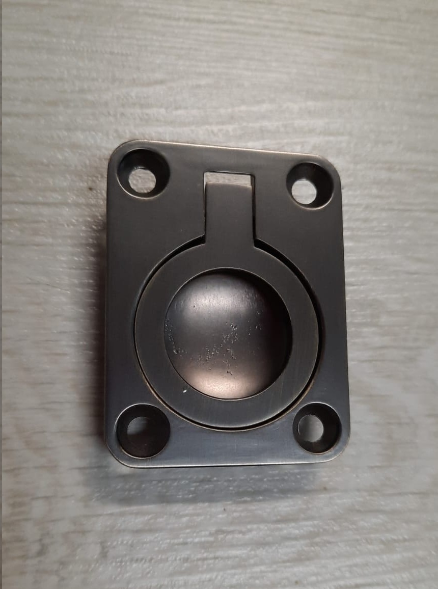 Maniglia per porta a libro anello bronzata