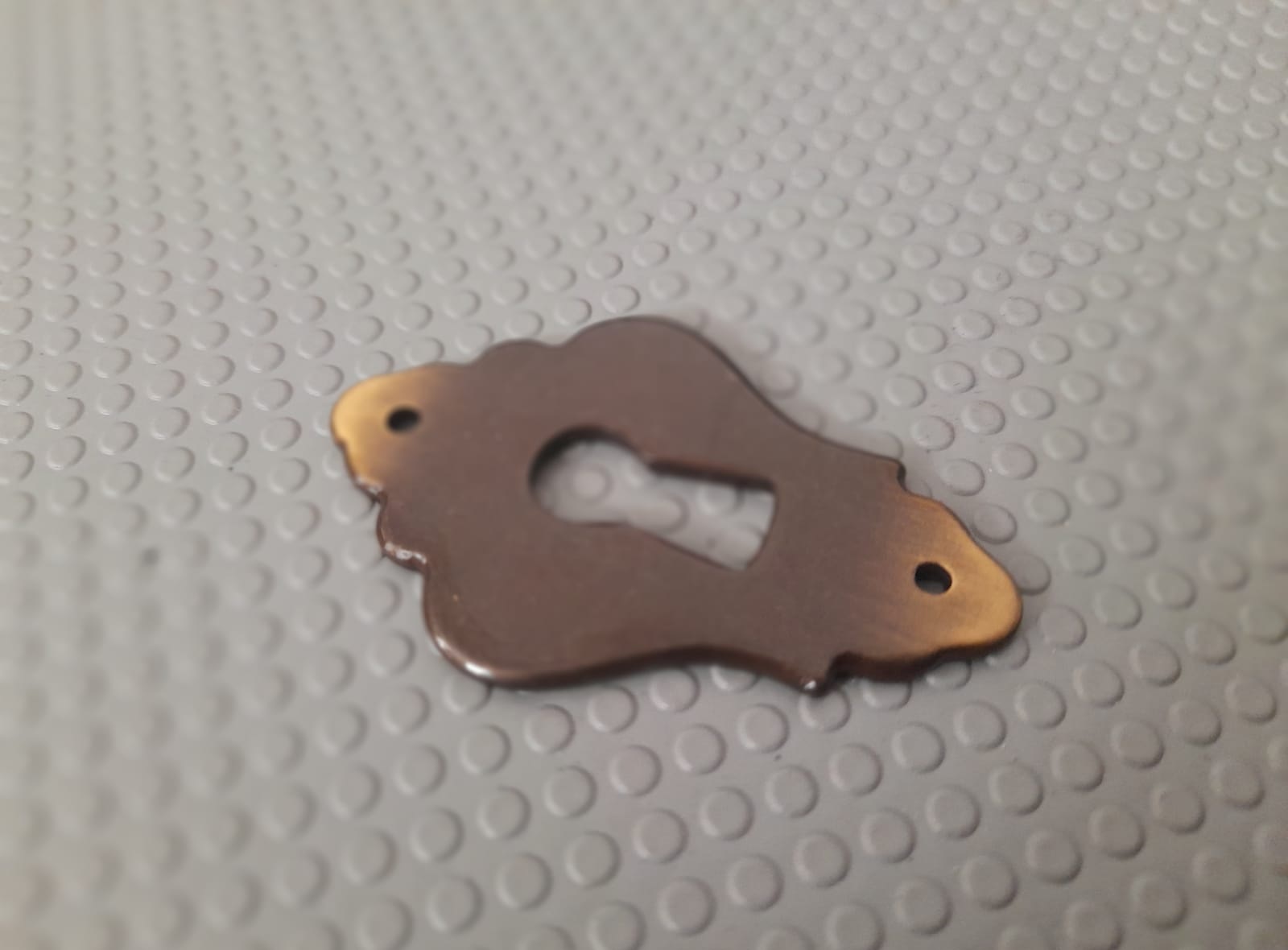 Bocchetta per mobili in finitura oro lucido e bronzo antico 