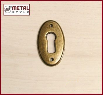 Bocchetta per mobili ovale anticata 30625037V009 Metalstyle